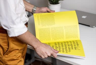 person holding book